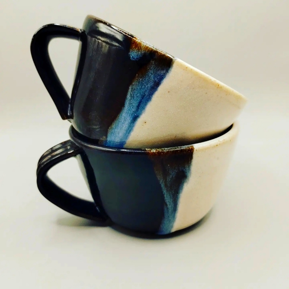 Handmade pottery mugs featuring moon faces 🌚